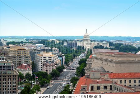 Aerial view of downtown Washington, D.C. including stretch of Pennsylvania Avenue and Capitol Hill