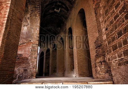 The Amphitheater of Santa Maria Capua Vetere, the second biggest roman amphitheater, tourist destination for cultural trips to Italy