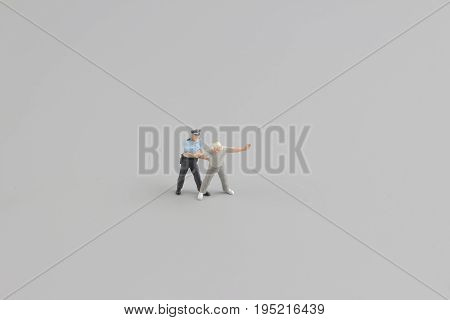 Mini Figure Of Policeman With Hand Cuffs