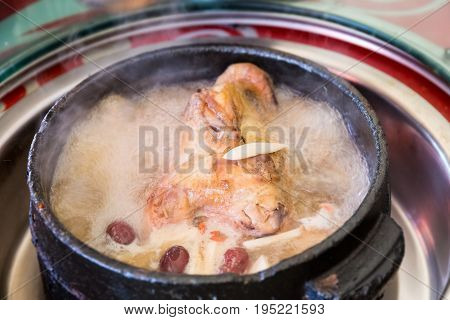 stone pot of chicken closeup tibetan delicious food