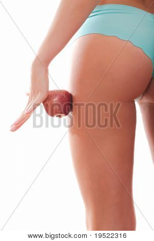 Perfecte vrouwelijke figuur en rode appel. Geïsoleerd op een witte achtergrond.