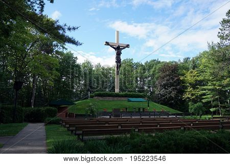 INDIAN RIVER, MICHIGAN / UNITED STATES - JUNE 18, 2017: The Cross in the Woods Roman Catholic National Shrine features the world's largest crucifix.