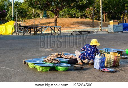 A Vendor At Street Market In Phan Rang, Vietnam