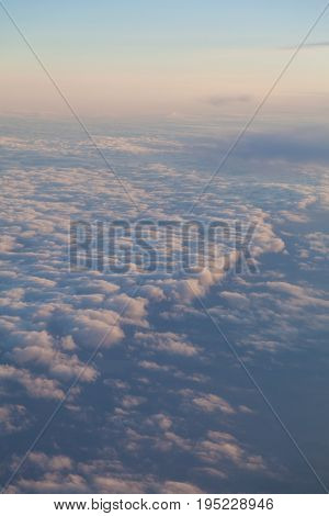 the sky above the clouds from aircraft iljuminatora at sunset