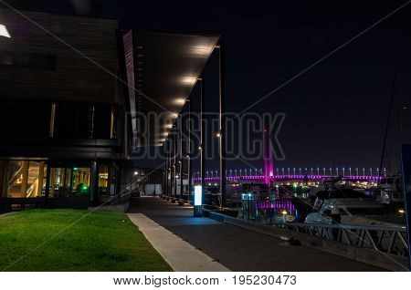 Melbourne, Australia - January 6, 2017: Library at the Docks and Bolte Bridge at Melbourne Docklands