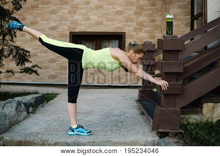 Mature Woman Stretching After Workout. Healthy Lifestyle.