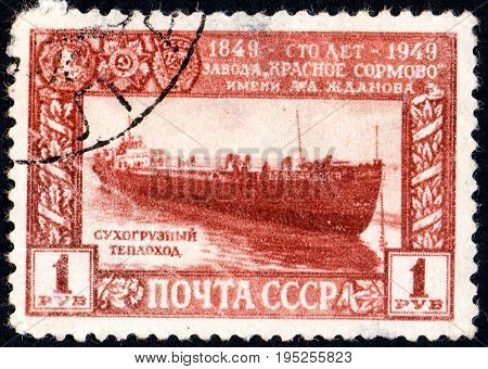 UKRAINE - CIRCA 2017: A postage stamp printed in USSR shows Dry cargo ship from the series Centenary of A.Zhdanov Krasnoye Sormovo Factory circa 1949