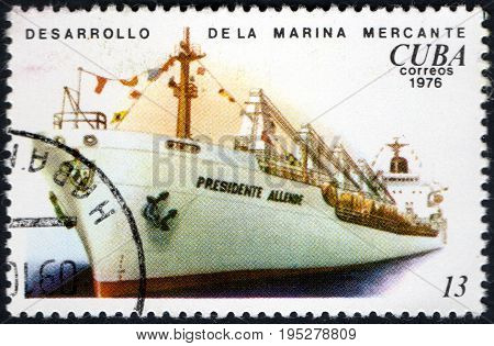 UKRAINE - CIRCA 2017: A postage stamp printed in Cuba shows Development of the merchant marine from the eries Cuban Shipping circa 1976