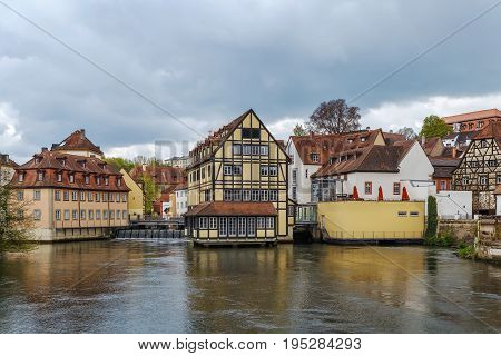 Embankment dam on Regnitz river in Bamberg city center Germany