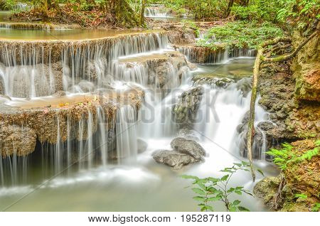 Huay mae kamin waterfall in Kanchanaburi Thailand in Abstract background