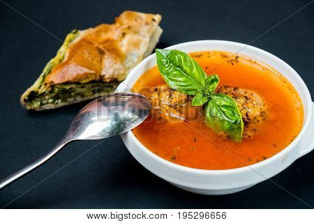 Vegetarian borscht basil Close up. Black background