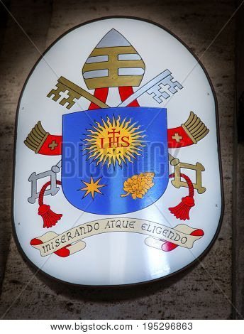 ROME, ITALY - JANUARY 18, 2017 Papal Symbol Santa Maria Della Pace Church Rome Italy. Church built in 1400 and 1500s by Pope Sixtus IV on the spot where a painted Madonna was pierced and blood came out.