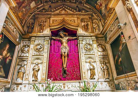 ROME, ITALY - JANUARY 18, 2017 Santa Maria Della Pace Church Basilica Jesus Cross Crucifixion Rome Italy. Church built in 1400 and 1500s by Pope Sixtus IV on the spot where a painted Madonna was pierced and blood came out.