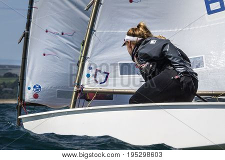 23 July 2015, Young sailors from around the World compete at the 2015 European Optimist Sailing Championships, held at the Welsh National Sailing Centre, Plas Heli, Wales. 