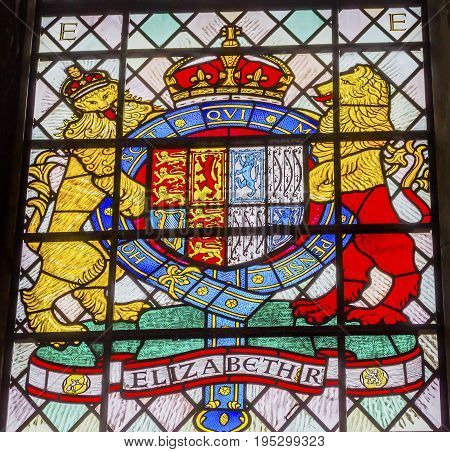 LONDON, ENGLAND - JANUARY 16, 2017 Elizabeth 1 Coat of Arms Stained Glass 13th Century Chapter House Westminster Abbey Church London England. Westminister Abbey has been the burial place of Britain's monarchs since the 11th century and is the setting for 