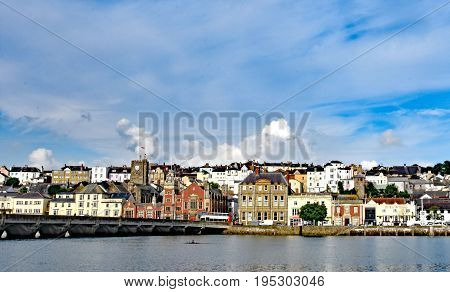 Bideford North Devon England 13th July 2017 - The quay and old bridge in the port of Bideford in North Devon England taken from Wooda Wharf looking west acfross the river Torridge