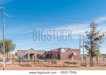 KAROS SOUTH AFRICA - JUNE 11 2017: A shopping centre at Karos a village on the N10 road between Groblershoop and Upington in the Northern Cape Province