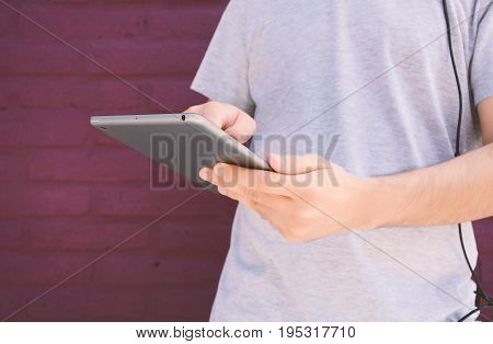 Man Using A Tablet.