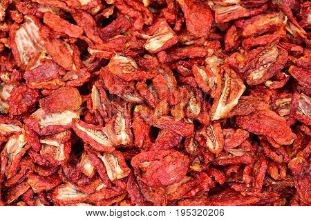Sun-dried tomatoes flat lay ingredients for Italian cuisine.