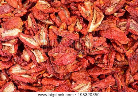 Sun-dried tomatoes flat lay ingredients for Italian cuisine.