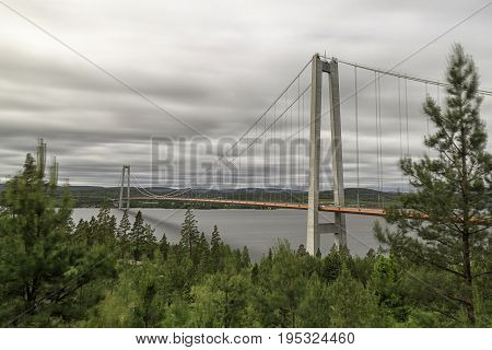 The High Coast Bride in Sweden with a cloudy sky.