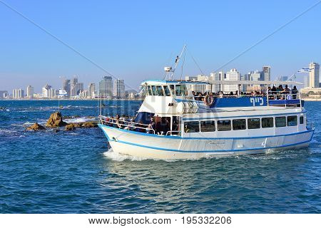 TEL AVIV ISRAEL - APRIL 2017: pleasure boat with tourists in Tel Aviv a tourist attraction.