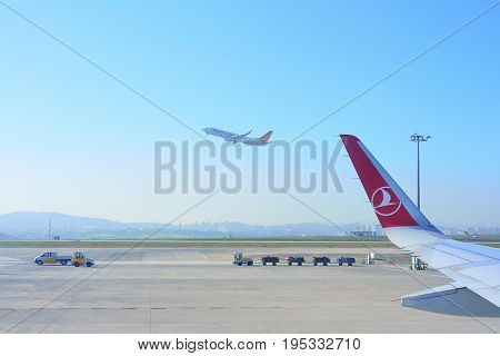 ISTANBUL TURKEY - APRIL 2017: Sabiha Gokcen airport. Airport jetway aerobridge skybridge. Airport air bridge. Pegasus and turkish airlines aircraft.