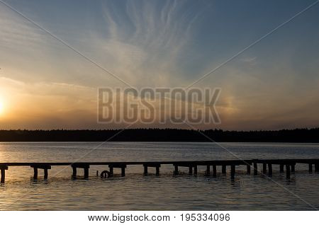 Sunset over Necko lake and bridge. podlasie, Poland.