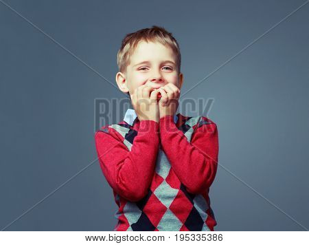 happy boy isolated against grey background