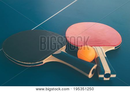 Tabletennis Or Ping Pong Rackets And Balls On Table. Sport Concept