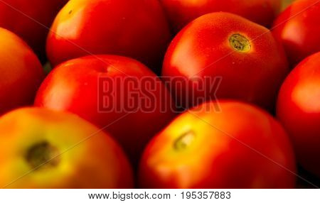 Fresh tomatoes on display at a nearby market.