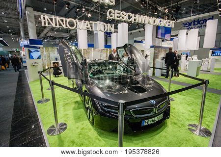HANNOVER GERMANY - MARCH 14 2016: BMW car in booth of Brother company at CeBIT information technology trade show in Hannover Germany on March 14 2016.