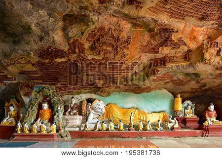 Reclining Buddha Statue Inside Kawgun Cave In Hpa-an, Myanmar (burma).