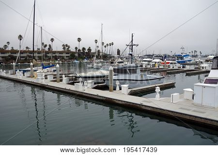 Recreational and fishing boats at the dock in Oxnard marina Ventura county Southern California Pacific coast; copy space