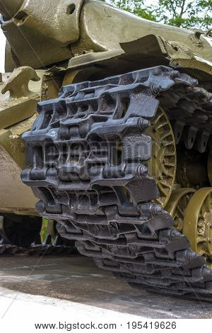 Tank Caterpillar Track with Wheels. The photo shows the tracks of a tank from the period of the Second World War.