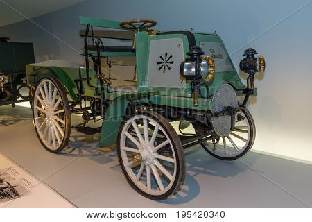 STUTTGART GERMANY- MARCH 19 2016: Vintage car Daimler Motor-Geschaeftswagen (Daimler motorized business vehile) 1899. Mercedes-Benz Museum.