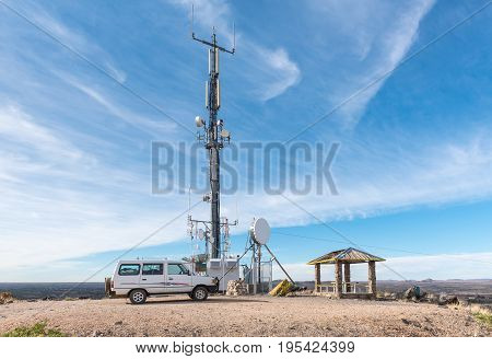 KEIMOES SOUTH AFRICA - JUNE 12 2017: A telecommunications tower and viewpoint on Tierberg (Tiger Mountain) in Keimoes in the Northern Cape Province