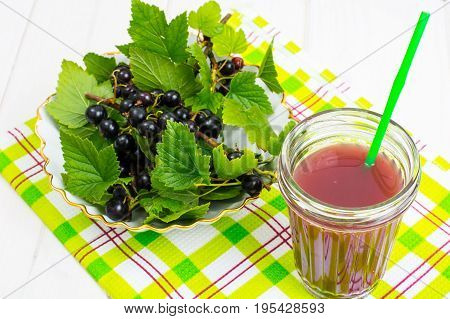 Useful vitamin fresh juice in glass on wooden table. Studio Photo