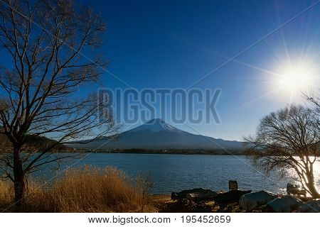 abstract winter season on mountain fuji and lake with sun light - can use to display or montage on product