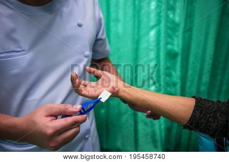 Soft focus and the background blurred nurses are contiguous with lesions of patients with wounds caused by an accident.dressing.