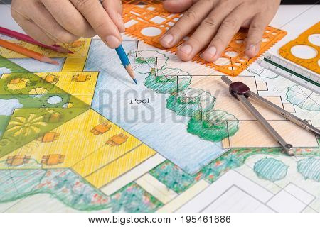 Save
Download Preview
Landscape architect Design hotel resort plan meeting with client .