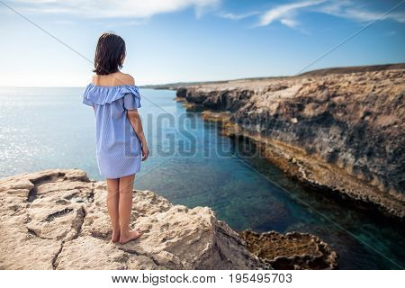 Young Woman Enjoying Beautiful Sea View On Greco Cape