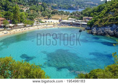 PALEOKASTRITSA CORFU GREECE - JULY 3 2017: Aerial view on the bay and beach Paleokastritsa with crystal sea water on the Island Corfu Greece.