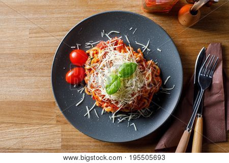 Overhead view of delicious pasta with tomato and meat. Stock image