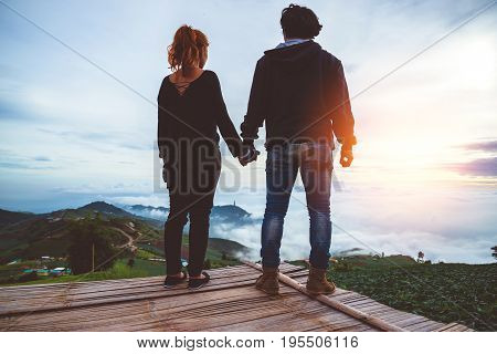 Lover Men and women Asia travel relax. Morning atmosphere nature Forests mountains. Phu Thap Buek Thailand