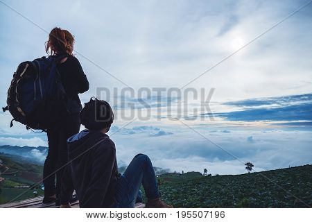 Lover Men and women Asia travel relax. Morning atmosphere nature Forests mountains. Phu Thap Buek Thailand