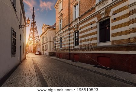 Collage of the street in Gliwice and Radiostation in the evening.