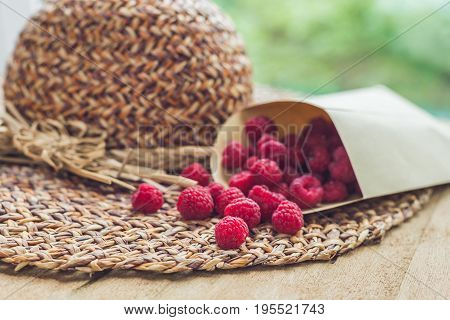 Summer Holiday, Vacation, Relaxation Concept. Raspberries, Straw Hat. Free Text Copy Space. Summer V