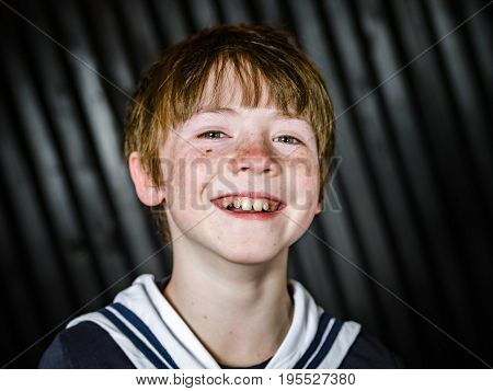 Schoolboy Posing In Sailor Costume With Emotions