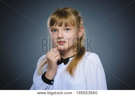Closeup Scared and shocked little girl. Human emotion face expression.